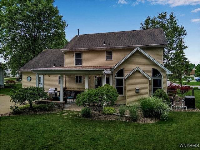 9210 Via Cimato Dr, Clarence, NY 14032 - back of house featuring a patio