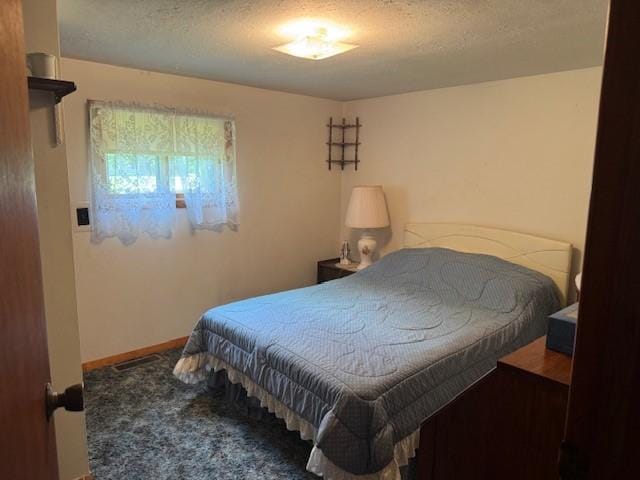 3627 Irish Ave Unit B, Willing, NY 14895 - bedroom featuring a textured ceiling and carpet floors