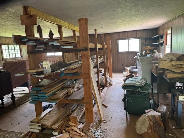3627 Irish Ave Unit B, Willing, NY 14895 - miscellaneous room with wooden walls and a textured ceiling