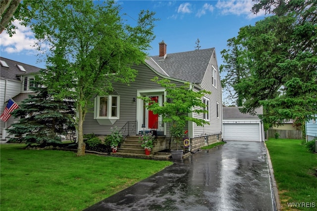 87 Pasadena Pl, Amherst, NY 14221 - view of front of home featuring a chimney, a front lawn, roof with shingles, and a garage