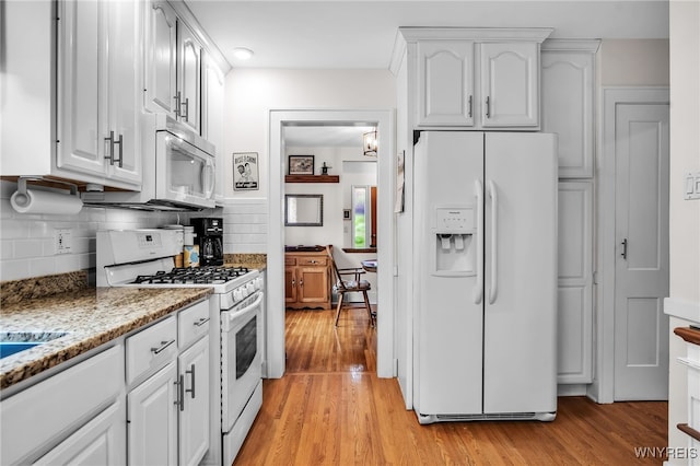 87 Pasadena Pl, Amherst, NY 14221 - kitchen with white appliances, light wood-style flooring, white cabinetry, and backsplash