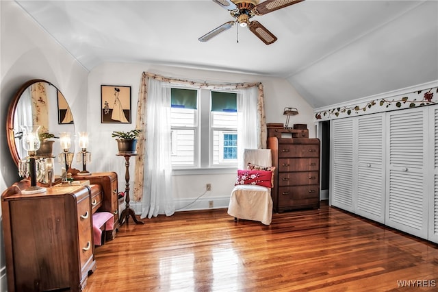 87 Pasadena Pl, Amherst, NY 14221 - living area featuring lofted ceiling, a ceiling fan, and wood finished floors