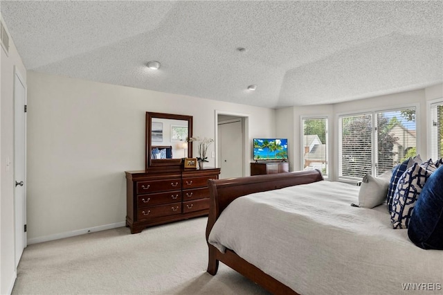 13 Thames Ct, Amherst, NY 14221 - carpeted bedroom featuring a textured ceiling and baseboards