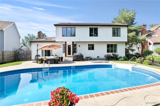 13 Thames Ct, Amherst, NY 14221 - back of house featuring a patio area, a fenced backyard, an outdoor hangout area, and entry steps