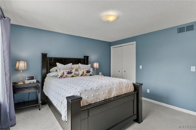 13 Thames Ct, Amherst, NY 14221 - bedroom with carpet, a textured ceiling, and a closet