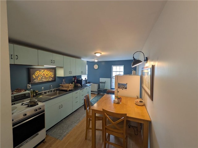 21 Charlotte Ave, Bradford City, PA 16701 - kitchen featuring gas range gas stove, light wood-style floors, and dark countertops