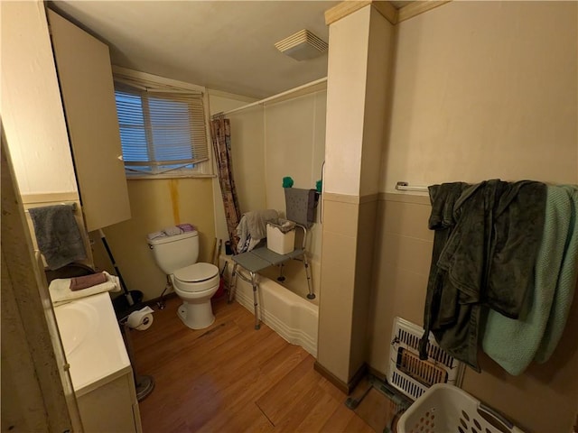21 Charlotte Ave, Bradford City, PA 16701 - full bathroom with wood finished floors, shower / bath combo with shower curtain, and vanity