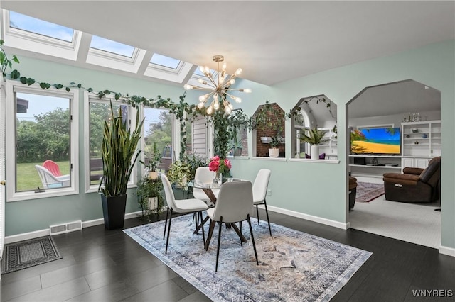 5103 Eastbrooke Pl, Clarence, NY 14221 - dining space featuring a skylight and a chandelier