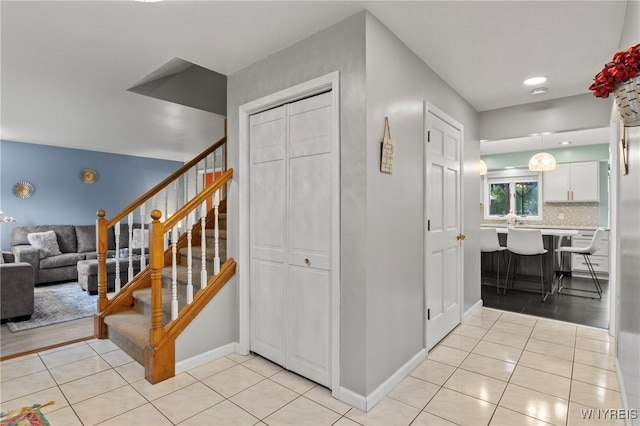 5103 Eastbrooke Pl, Clarence, NY 14221 - entrance foyer with light tile patterned flooring and stairway