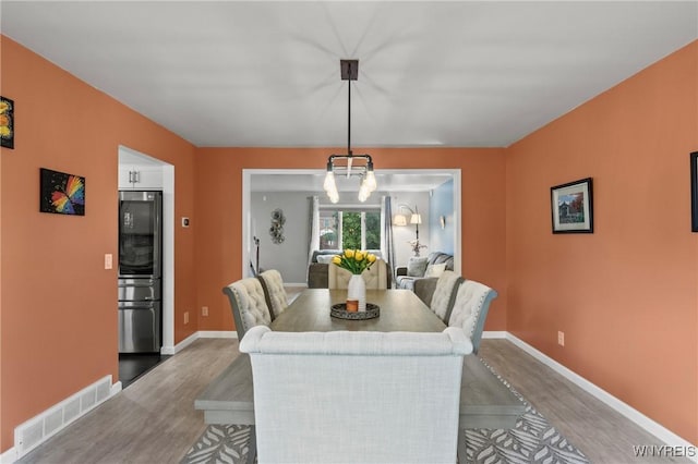 5103 Eastbrooke Pl, Clarence, NY 14221 - dining area with wood finished floors