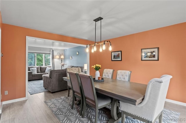 5103 Eastbrooke Pl, Clarence, NY 14221 - dining area with wood finished floors and baseboards