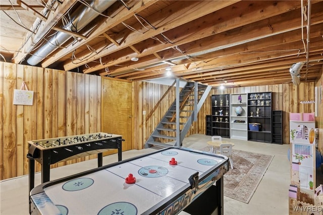 5103 Eastbrooke Pl, Clarence, NY 14221 - game room with concrete flooring and wooden walls