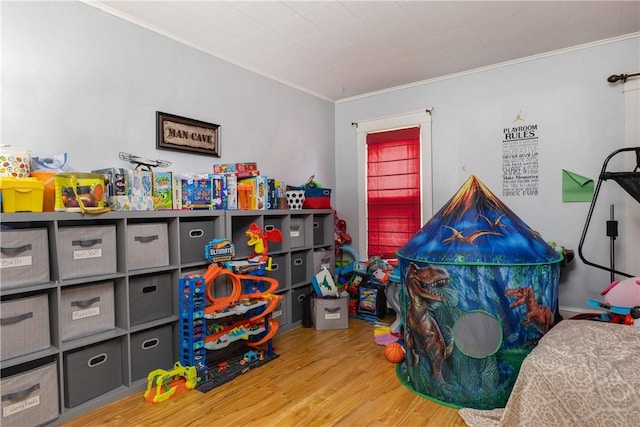 109 Oakwood Ave, Elmira, NY 14903 - playroom with ornamental molding and wood finished floors