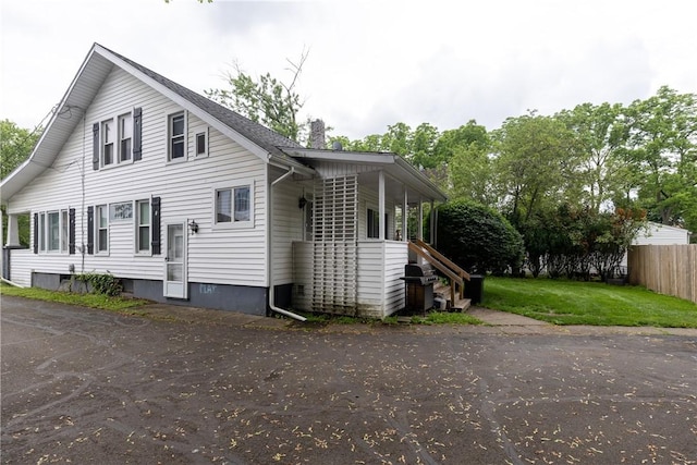 109 Oakwood Ave, Elmira, NY 14903 - view of side of home featuring a chimney