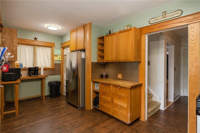 109 Oakwood Ave, Elmira, NY 14903 - kitchen featuring stainless steel fridge with ice dispenser, dark wood-style flooring, open shelves, wooden counters, and an office area