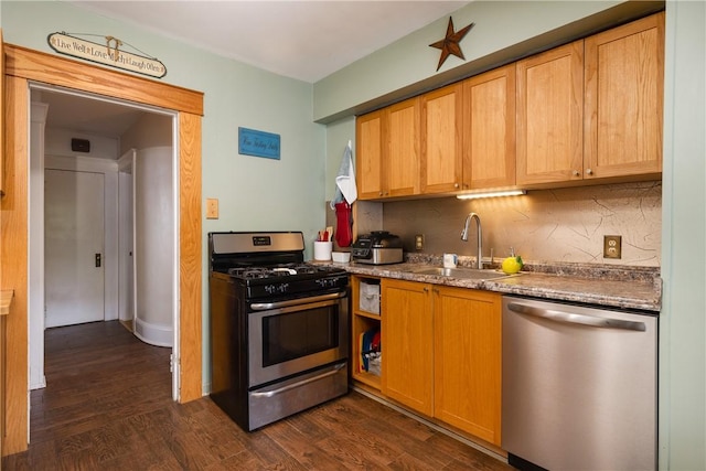 109 Oakwood Ave, Elmira, NY 14903 - kitchen featuring stainless steel appliances, dark wood-style flooring, and tasteful backsplash