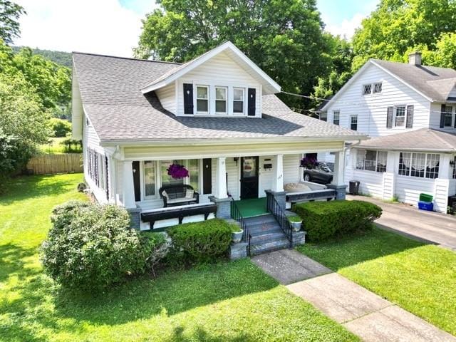 109 Oakwood Ave, Elmira, NY 14903 - bungalow-style home featuring covered porch and roof with shingles
