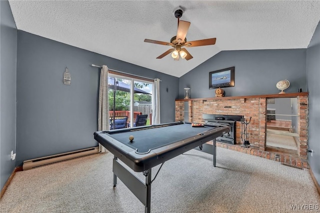 295 Continental Dr, Lockport City, NY 14094 - rec room with baseboard heating, a ceiling fan, carpet flooring, a fireplace, and vaulted ceiling