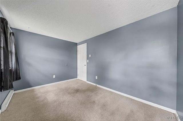 295 Continental Dr, Lockport City, NY 14094 - carpeted empty room featuring a textured ceiling and baseboards