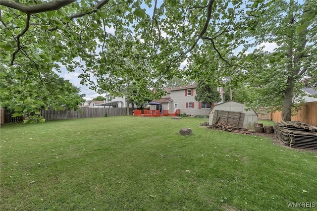 295 Continental Dr, Lockport City, NY 14094 - fenced backyard with a storage shed and a deck