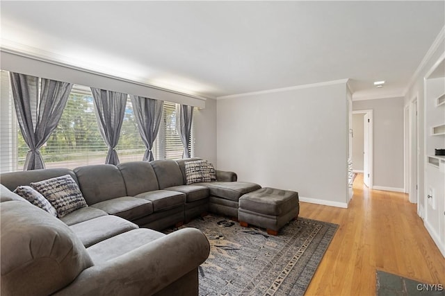 129 Butternut Dr, Dewitt, NY 13214 - living room with crown molding and light wood-style flooring