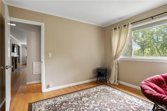 129 Butternut Dr, Dewitt, NY 13214 - living area featuring wood finished floors and crown molding
