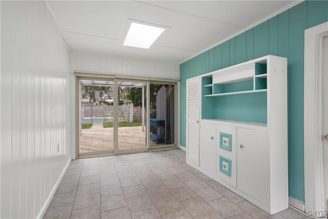 129 Butternut Dr, Dewitt, NY 13214 - spare room with crown molding and tile patterned flooring