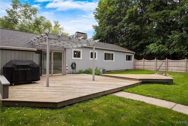 129 Butternut Dr, Dewitt, NY 13214 - rear view of property with a fenced backyard, a pergola, a wooden deck, and a chimney