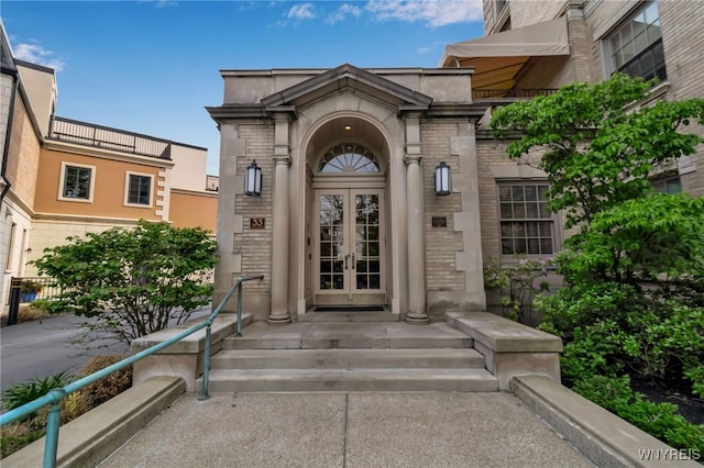 33 Gates Cir Unit 6B, Buffalo, NY 14222 - view of exterior entry with french doors and brick siding