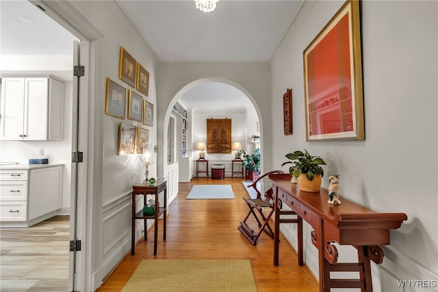 33 Gates Cir Unit 6B, Buffalo, NY 14222 - corridor with arched walkways and light wood finished floors