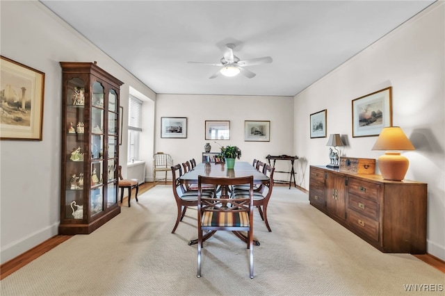 33 Gates Cir Unit 6B, Buffalo, NY 14222 - dining room with a ceiling fan and baseboards