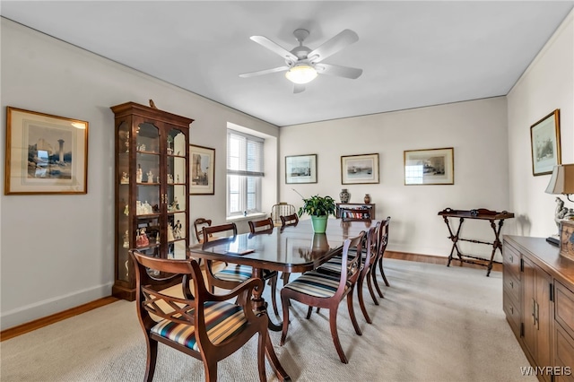 33 Gates Cir Unit 6B, Buffalo, NY 14222 - dining area with a ceiling fan and baseboards