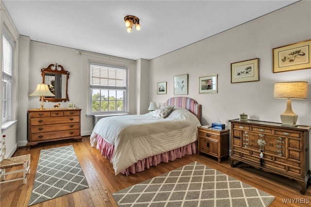 33 Gates Cir Unit 6B, Buffalo, NY 14222 - bedroom with wood finished floors