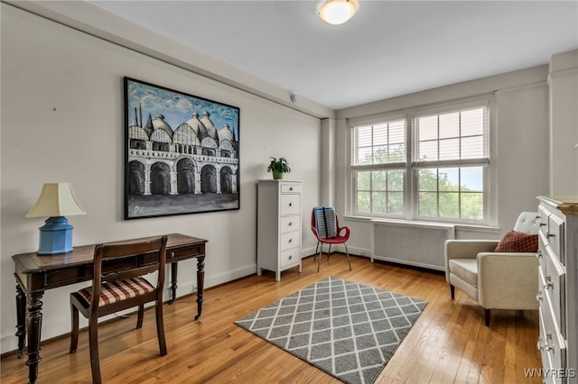 33 Gates Cir Unit 6B, Buffalo, NY 14222 - office with radiator heating unit and wood finished floors
