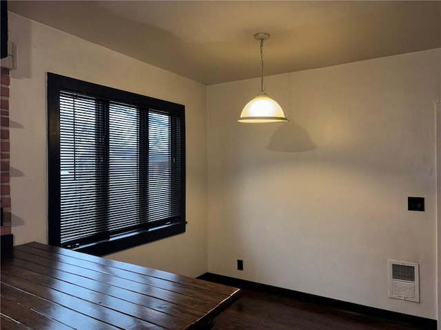 92 Abbott St, Rochester, NY 14606 - unfurnished dining area featuring dark wood finished floors and baseboards