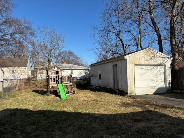 92 Abbott St, Rochester, NY 14606 - view of yard featuring a playground, an outdoor structure, and a detached garage