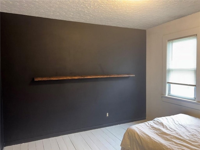 92 Abbott St, Rochester, NY 14606 - bedroom featuring a textured ceiling and multiple windows