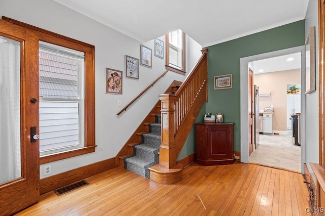 133 Bryant Ave, Syracuse, NY 13204 - entrance foyer featuring hardwood / wood-style floors, crown molding, and stairs