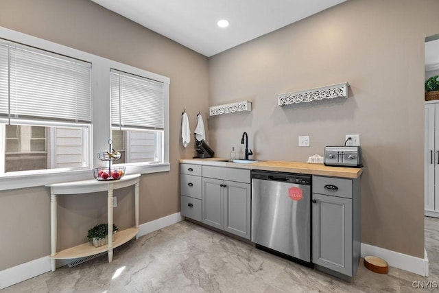 133 Bryant Ave, Syracuse, NY 13204 - kitchen featuring dishwasher, gray cabinets, wooden counters, light marble finish flooring, and recessed lighting