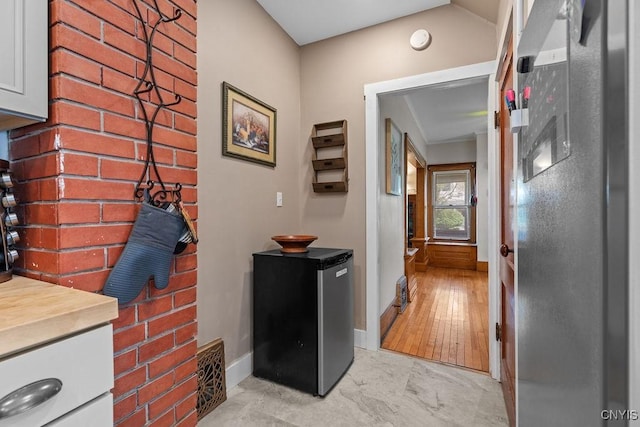 133 Bryant Ave, Syracuse, NY 13204 - hall with baseboards and light marble finish floors