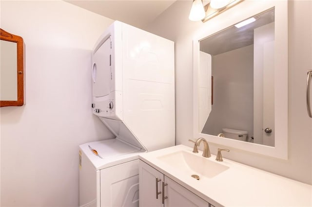 10 Chesfield Lookout, Perinton, NY 14450 - half bath featuring estacked washer and dryer and vanity