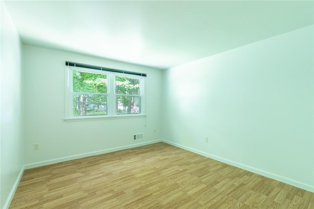 10 Chesfield Lookout, Perinton, NY 14450 - spare room with light wood-style flooring and baseboards