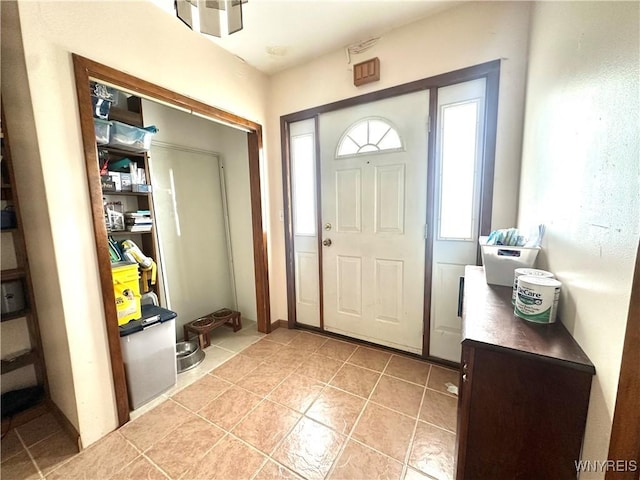 914 S Main St, Shelby, NY 14103 - entryway with light tile patterned floors