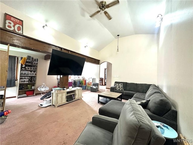 914 S Main St, Shelby, NY 14103 - carpeted living area with ceiling fan, lofted ceiling, and arched walkways