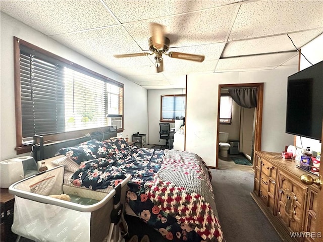 914 S Main St, Shelby, NY 14103 - bedroom with a paneled ceiling, multiple windows, cooling unit, carpet, and ensuite bath