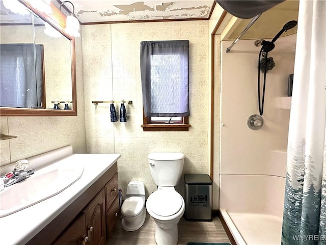 914 S Main St, Shelby, NY 14103 - bathroom featuring a stall shower, vanity, and wood finished floors