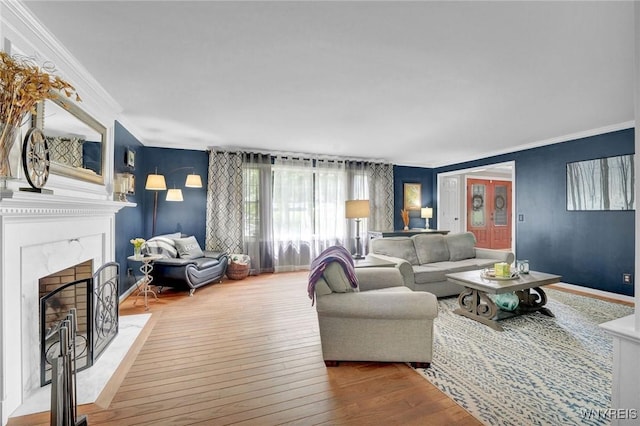 135 Fox Meadow Ln, Orchard Park, NY 14127 - living area with ornamental molding, hardwood / wood-style flooring, and a fireplace