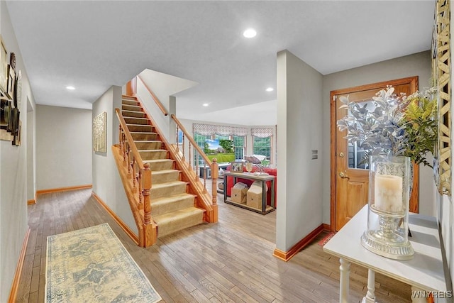 135 Fox Meadow Ln, Orchard Park, NY 14127 - foyer entrance with light wood-type flooring, stairs, and recessed lighting