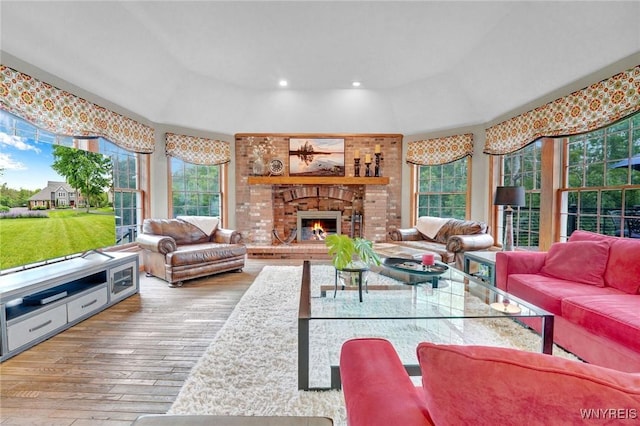 135 Fox Meadow Ln, Orchard Park, NY 14127 - living room with wood-type flooring, a fireplace, and recessed lighting