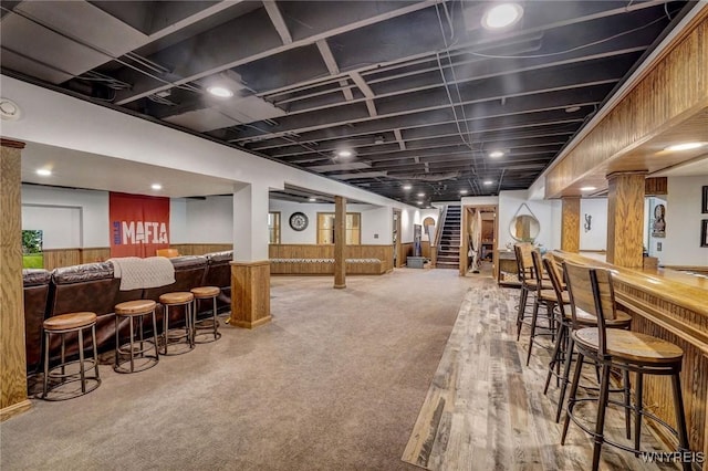 135 Fox Meadow Ln, Orchard Park, NY 14127 - indoor dry bar with wainscoting, wood walls, stairway, and carpet